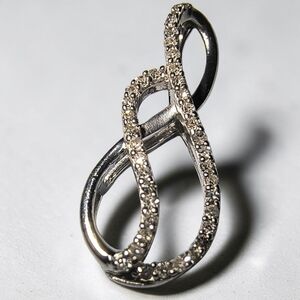 Sterling Silver And Clear Gemstone Sparkle Infinity Pendant